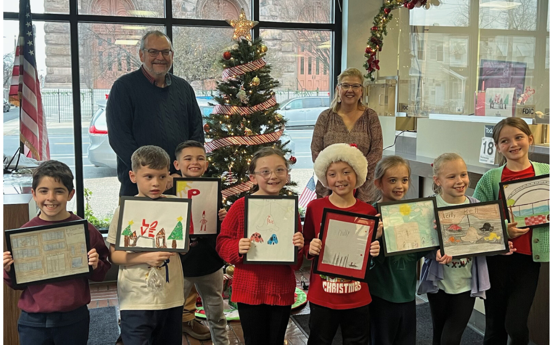 Local students display their winning art contest pages for our calendar contest, themed What I love About Philadelphia