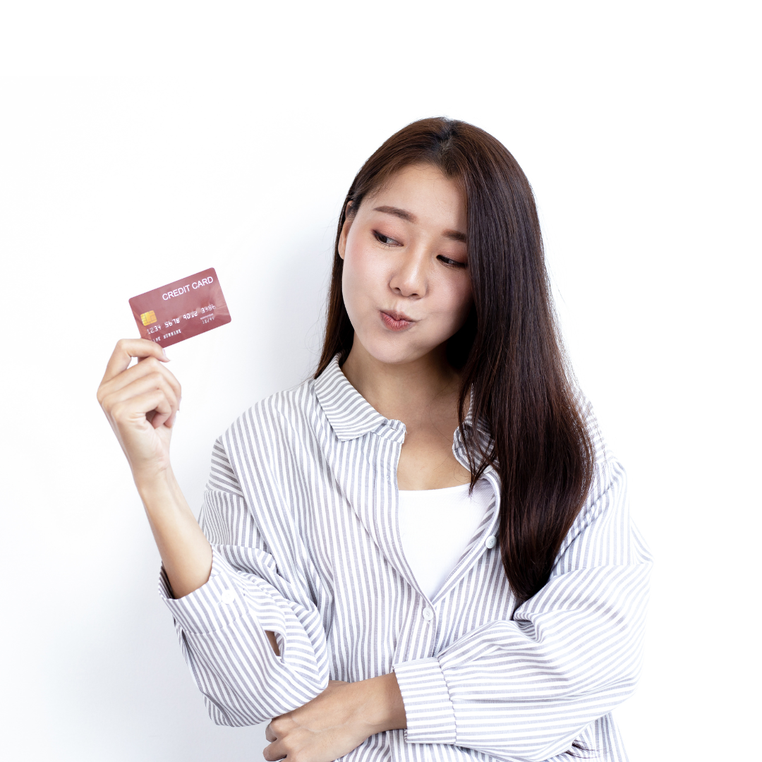 Teenager holding a credit card