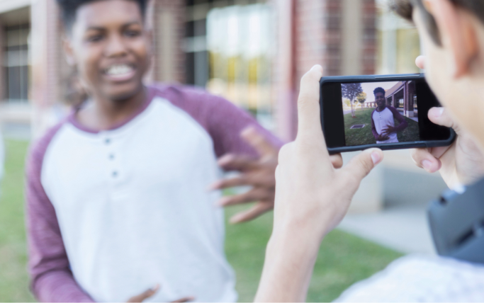 Teenage boys making a video for the Lights, Camera, Save Contest