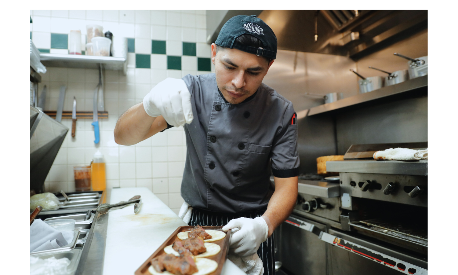 Photo of Chef at work in Nemi Mexican Restaurant and Bar, business customers of Port Richmond Savings